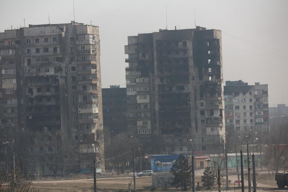 MARIUPOL, UKRAINE - MARCH 24: A view of damaged buildings as civilians are being evacuated along humanitarian corridors from the Ukrainian city of Mariupol under the control of Russian military and pro-Russian separatists, on March 24, 2022. (Photo by Leon Klein/Anadolu Agency via Getty Images)