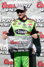 TALLADEGA, AL - OCTOBER 22: Mark Martin, driver of the #5 GoDaddy.com Chevrolet, celebrates setting the pole position in qualifying for the NASCAR Sprint Cup Series Good Sam Club 500 at Talladega Superspeedway on October 22, 2011 in Talladega, Alabama. (Photo by Jeff Zelevansky/Getty Images for NASCAR)