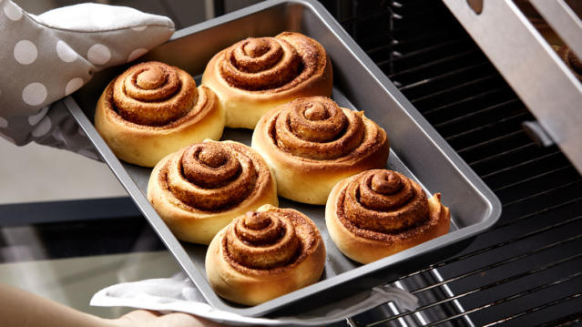 Why You Should Always Place A Baking Sheet Under Food In The Oven