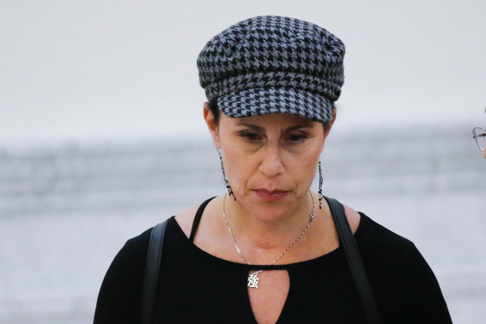 FILE - In this June 8, 2017, file photo, Lili Bernard walks out of the courtroom during a lunch break at Bill Cosby's sexual assault trial at the Montgomery County Courthouse in Norristown, Pa. Bernard, a prominent Cosby accuser filed suit Thursday, Oct. 14, 2021, against the actor over a 1990 hotel room encounter in Atlantic City, N.J. Lili Bernard's lawsuit comes just before the state's two-year window to file older sexual assault claims expires Thursday. (Eduardo Munoz Alvarez/Pool Photo via AP, File)