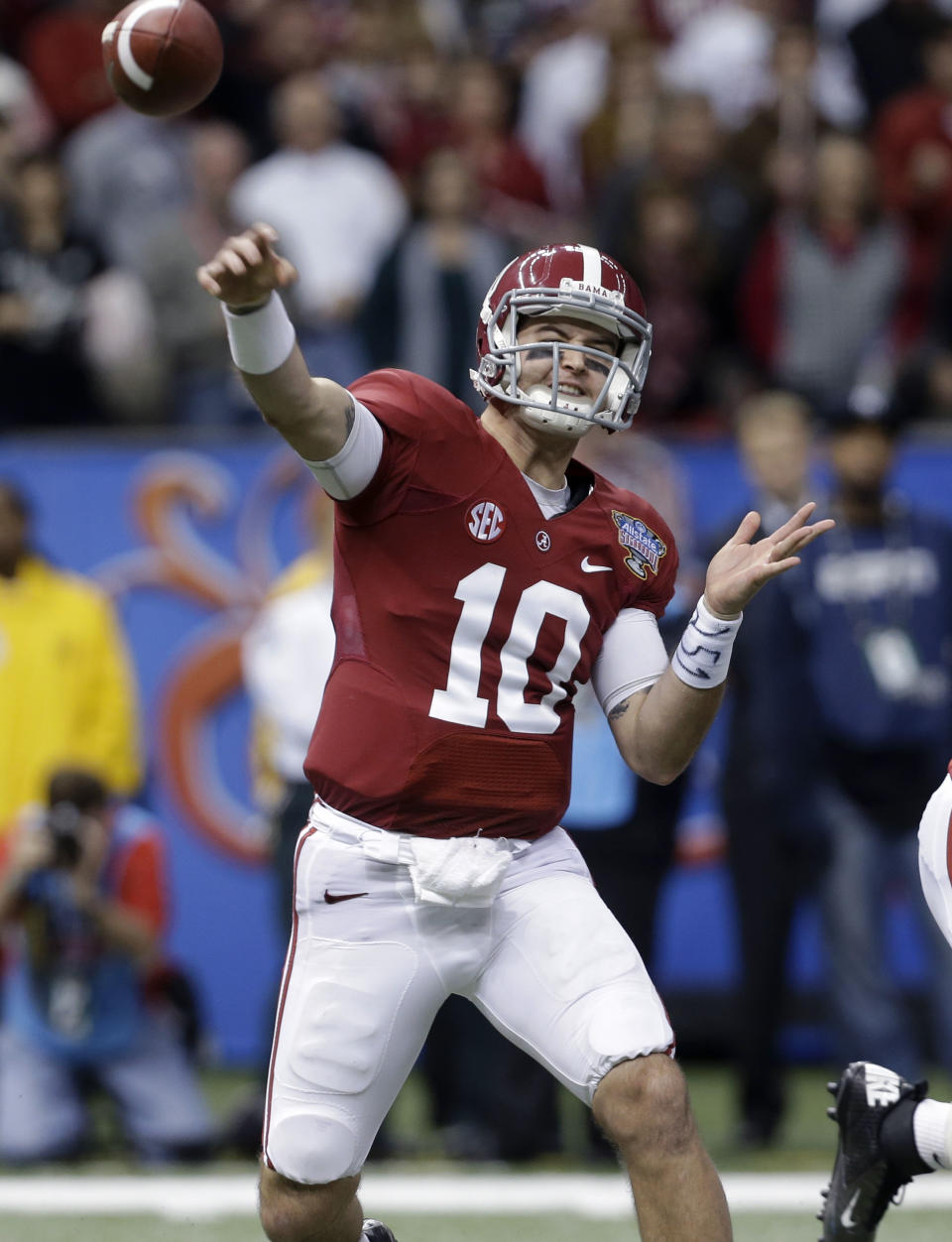 Alabama quarterback AJ McCarron throws during the second half of the NCAA college football Sugar Bowl against Oklahoma in New Orleans, Thursday, Jan. 2, 2014. (AP Photo/Rusty Costanza)
