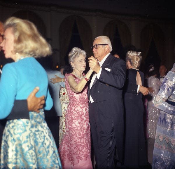 Marjorie Merriweather Post raised to international stature the Palm Beach Red Cross Ball. She's seen here at one of the balls in the 1960s, dancing with Fred Korth.