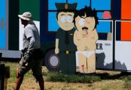 Workers finish off an outdoor display of the television show "South Park" for the start of Comic-Con International in San Diego, California, United States, July 20, 2016. REUTERS/Mike Blake