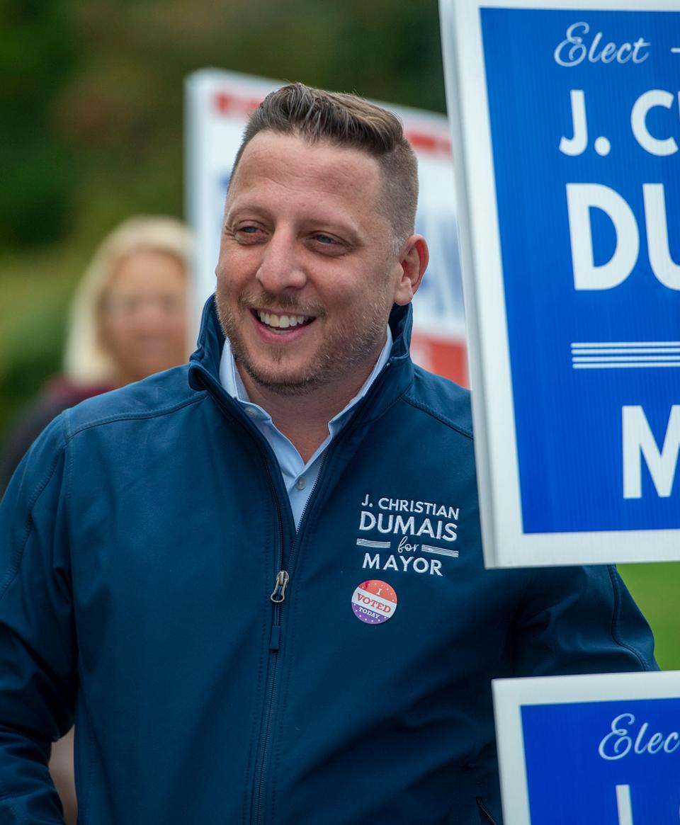 Mayoral candidate J. Christian Dumais is shown meeting voters at the Whitcomb Middle School voting place, Oct. 10, 2023.
