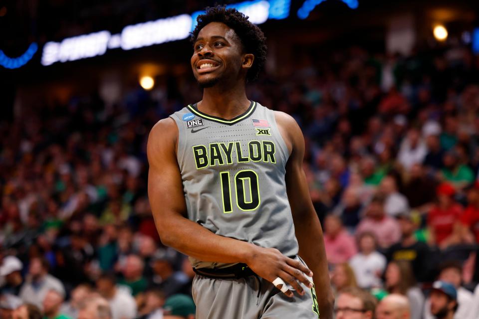 Mar 17, 2023; Denver, CO, USA;  Baylor Bears guard Adam Flagler (10) reacts to a play during the second half against UC Santa Barbara Gauchos in the first round of the 2023 NCAA men’s basketball tournament at Ball Arena. Mandatory Credit: Michael Ciaglo-USA TODAY Sports