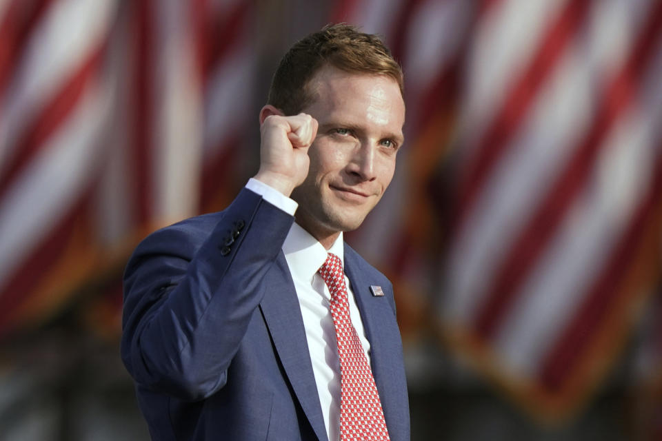 FILE—Republican congressional candidate Max Miller pumps his fist before speaking at a rally at the Lorain County Fairgrounds, in this , June 26, 2021 file photo, in Wellington, Ohio. Miller is seeking the Republican nomination for Ohio's 7th congressional district, (AP Photo/Tony Dejak, File)