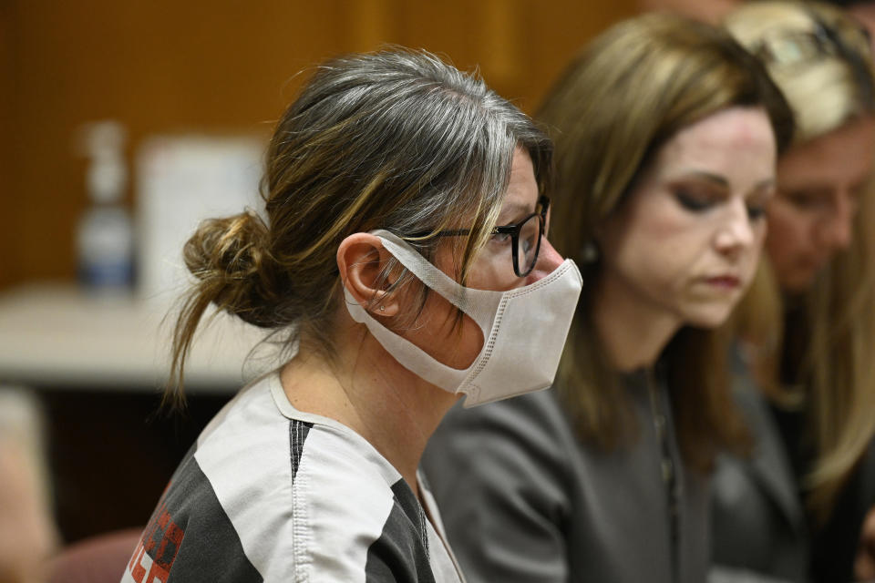 Jennifer Crumbley, left, mother of accused shooter Ethan Crumbley, sits with her attorney, Shannon Smith, in the courtroom of Judge Cheryl Matthews for a hearing Monday, June 27, 2022 at Oakland County Circuit Court in Pontiac Mich. Lawyers representing the parents of a Michigan teenager charged in a shooting at Oxford High School that left four of his fellow students dead say they plan to call him to testify at the couple’s trial. (Jose Juarez/Detroit News via AP)