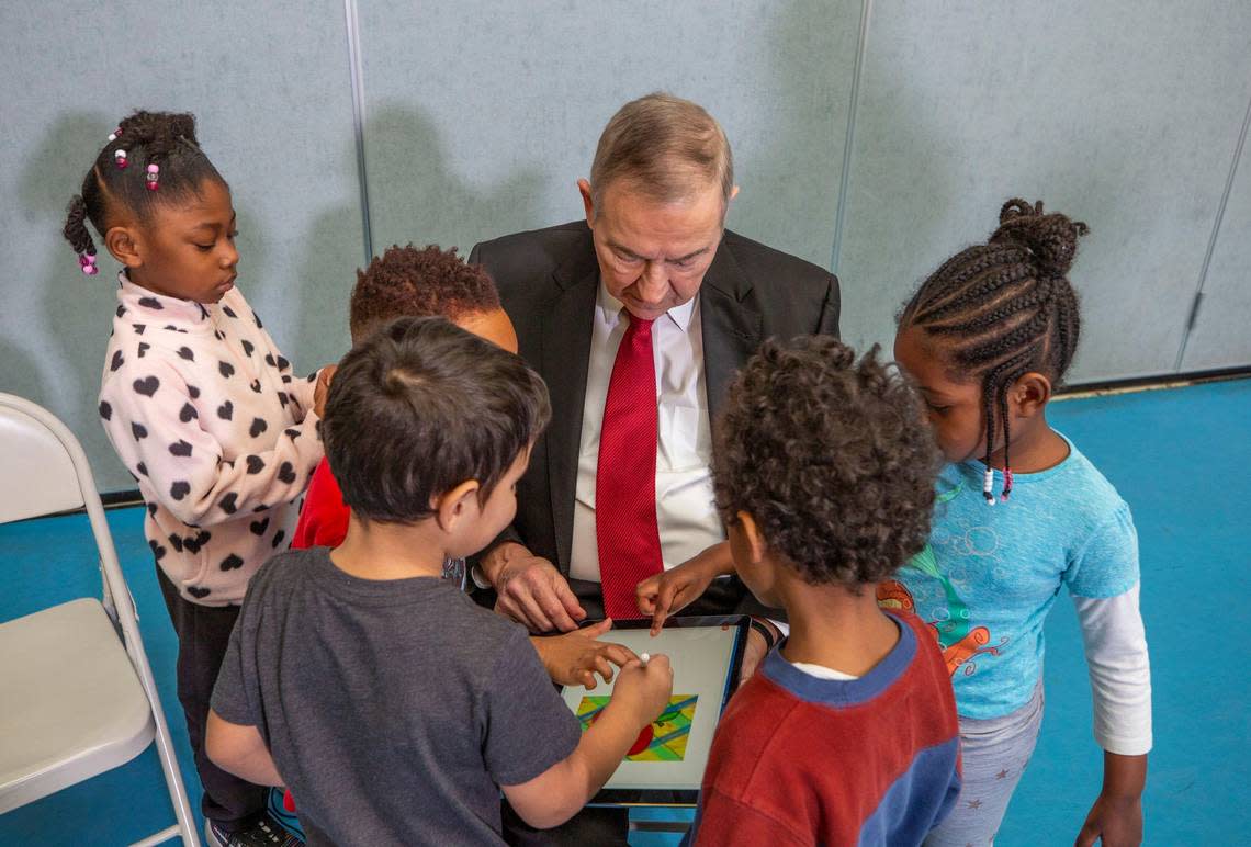 Jim Goodnight, CEO of SAS, reads to kindergarten children after a press conference with other prominent CEOs in the state to discuss the importance of increasing participation in NC Pre-K to 75 percent of eligible children, at Millbrook Elementary School on Thursday, Jan. 17, 2019, in Raleigh, NC.