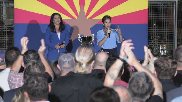 PHOTO: Tulsi Gabbard and Kari Lake appear onstage together at a campaign event for Kari Lake in Arizona, on Oct. 18, 2022. (ABC News)