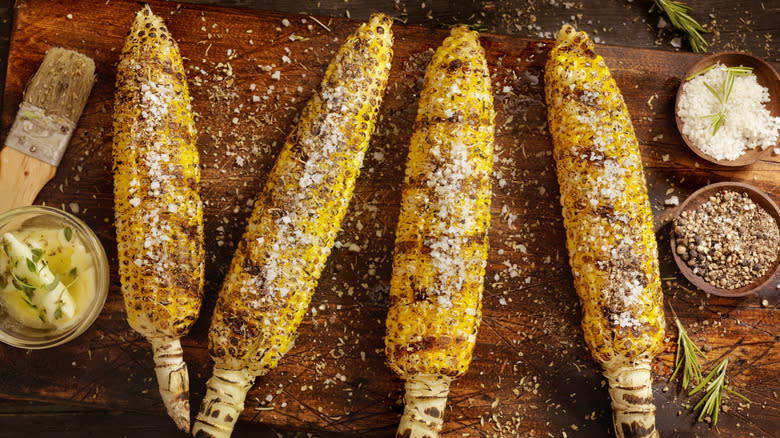 Corn on the cob with seasonings and butter