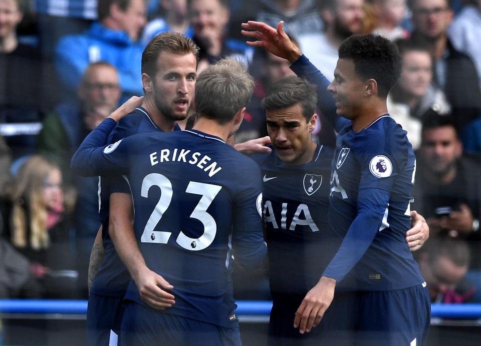 <p>Harry Kane of Tottenham Hotspur celebrates scoring his sides first goal with his Tottenham Hotspur team mates (Photo by Gareth Copley/Getty Images) </p>