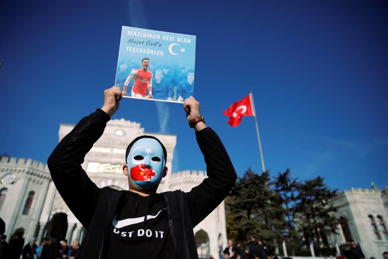 Ethnic Uighur demonstrators attend a protest against China in Istanbul