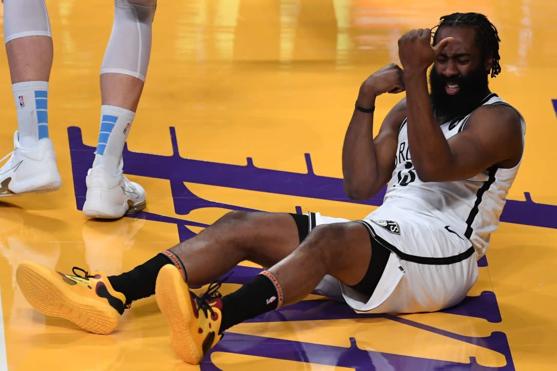 James Harden of the Brooklyn Nets reacts after a foul