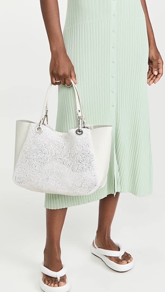 <p>A classic summer tote is a wardrobe staple. This white <span>Rag &amp; Bone Revival Summer Mini Tote</span> ($395) fits all your essentials. It works on everything from a beach bag to a work tote and weekender.</p>