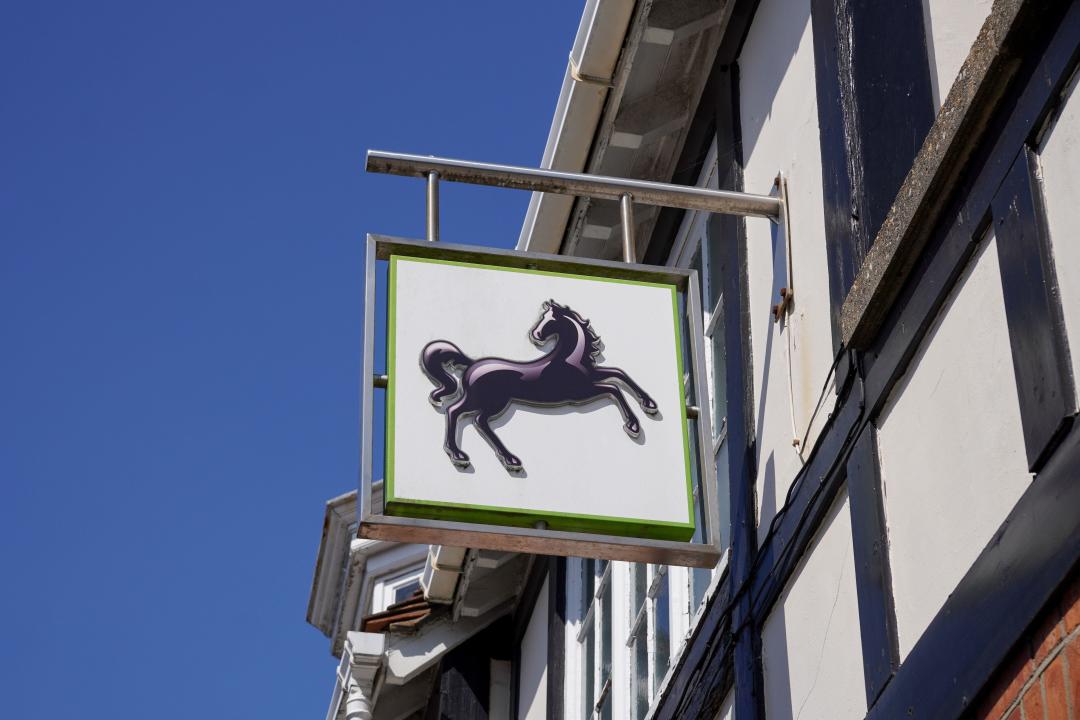 New Milton England 5 June 2024 - Lloyds bank logo on sign outside high street bank branch in the UK. Money and financial services