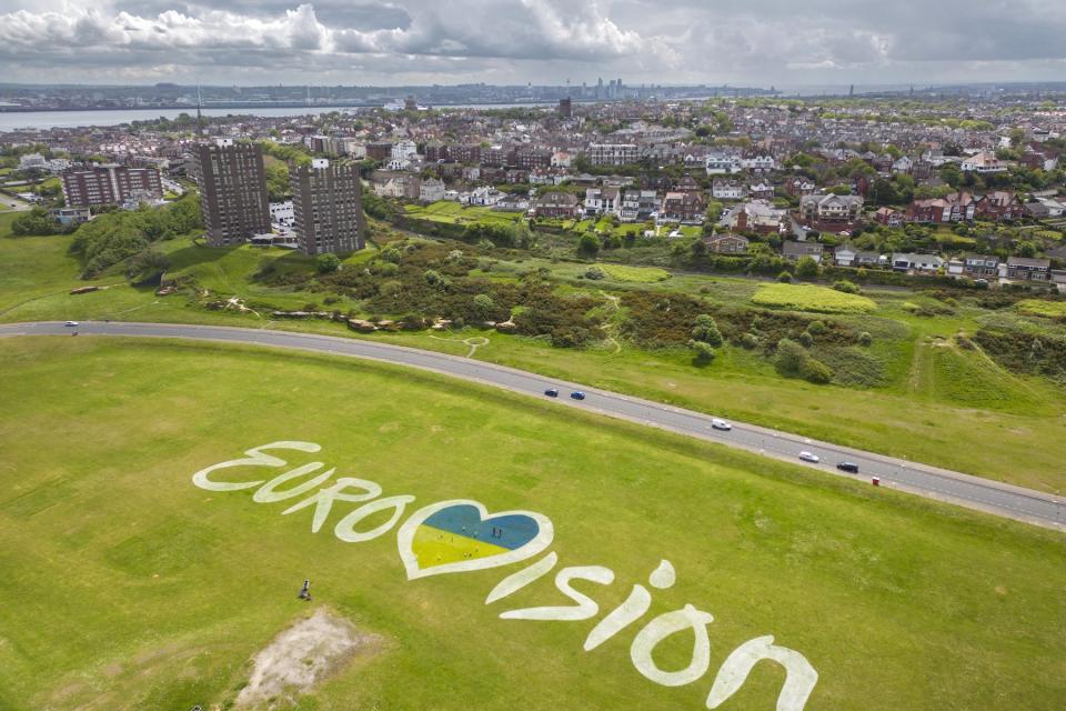 Aerial view of a giant mural of the Eurovision 2023 logo incorporating the Ukrainian flag adorns the dips at New Brighton on May 11, 2023, in Liverpool, England.