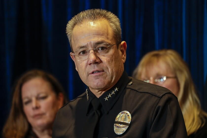 LOS ANGELES, CA - JANUARY 15, 2020 - LAPD Chief Michel Moore, addresses a press conference, flanked by Anne Tremblay, left, Director of Mayor's Gang Reduction and Youth Development and Eileen M. Decker, President Los Angeles Police Commission, at LAPD Headquarters on January 15, 2020, to discuss 2019 crime statistics of Los Angeles. (Irfan Khan / Los Angeles Times)