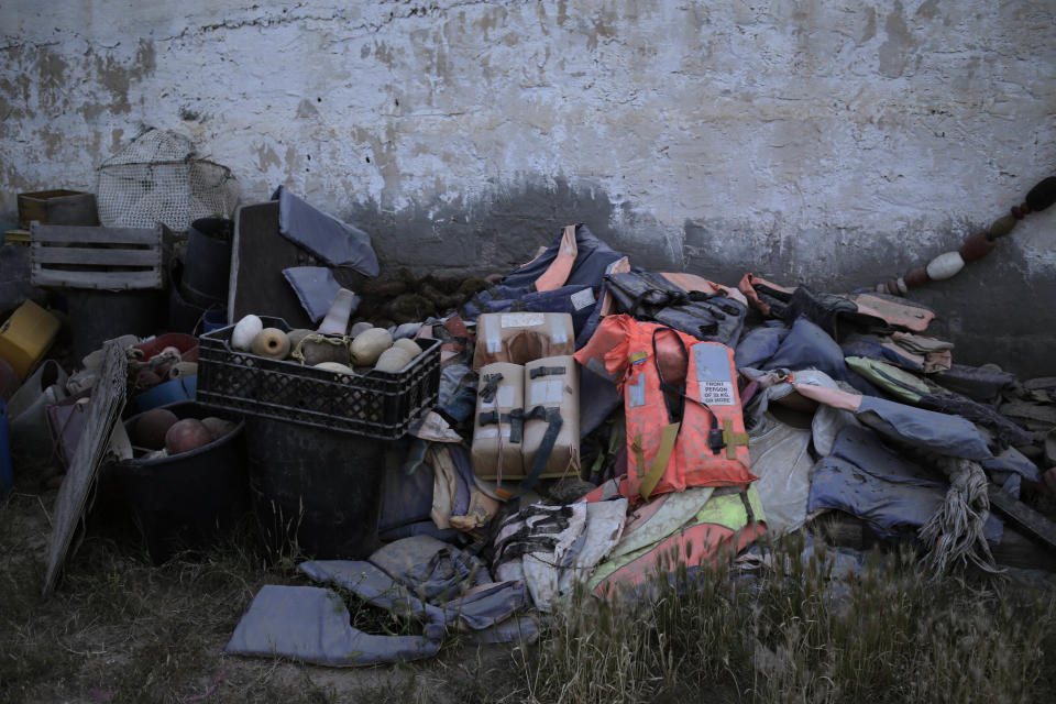 This April 15, 2018 photo shows the belongings of migrants which were collected by artist Mohsen Lahzib, who tries to create beauty out of sorrow, at his space in the southern port town of Zarzis, Tunisia. (AP Photo/Nariman El-Mofty)