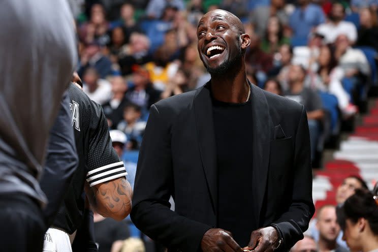 This is the only time Kevin Garnett ever enjoyed sitting on an NBA bench. (Getty Images)