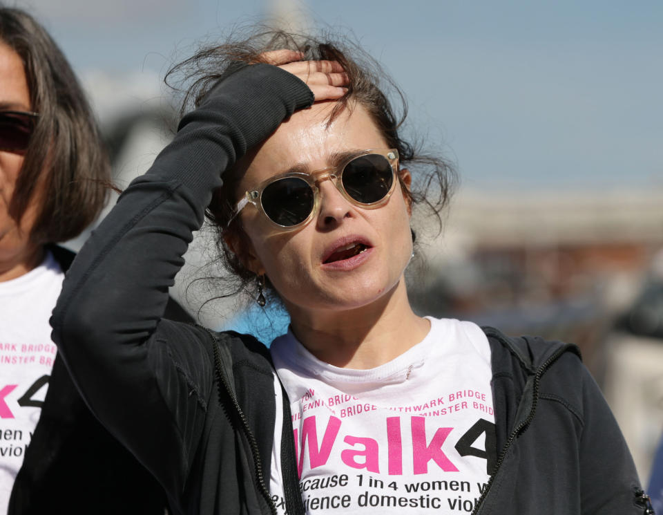 Helena Bonham Carter joins survivors and supporters walking across Millennium Bridge, London, during Refuge's 10km walk to raise funds for the domestic violence charity.