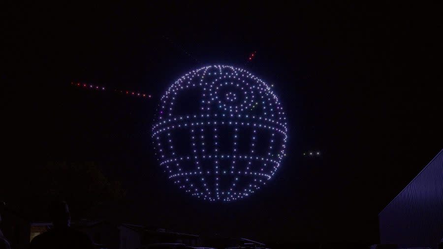 Drones magically form various scenes from film & television in the sky, including the Death Star from Lucas Film’s “Star Wars” franchise during testing in France of the new nighttime show coming to Walt Disney World Resort in Lake Buena Vista, Fla. later this month. The limited-time show, “Disney Dreams That Soar presented by AT&T,” runs at Disney Springs from May 24 to Aug. 2, 2024, and utilizes cutting-edge drone technology to feature a collection of fan-favorite characters utilizing cutting-edge technology and 800 drones, plus LED lights, choreographed to a sweeping original music score.. (Sylvain Beche, photographer)