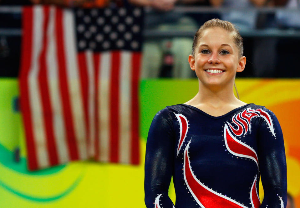 Gold medalist Shawn Johnson of the United States stands on the podium during the medal ceremony for the Women's Beam Final at the National Indoor Stadium on Day 11 of the Beijing 2008 Olympic Games on August 19, 2008 in Beijing, China.