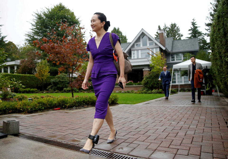 Huawei Technologies Chief Financial Officer Meng Wanzhou leaves her home to appear for a hearing at British Columbia supreme court, in Vancouver, British Columbia, Canada September 23, 2019. REUTERS/Lindsey Wasson/File Photo SEARCH "GLOBAL POY" FOR THIS STORY. SEARCH "REUTERS POY" FOR ALL BEST OF 2019 PACKAGES. TPX IMAGES OF THE DAY.