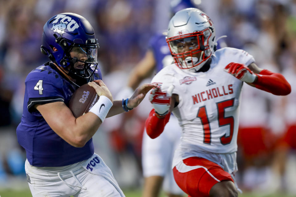 TCU quarterback Chandler Morris (4) runs for a touchdown while being chased by Nicholls State defensive back Kendarius Smith (15) during the first half of an NCAA college football game, Saturday, Sept. 9, 2023, in Fort Worth, Texas. (AP Photo/Gareth Patterson)