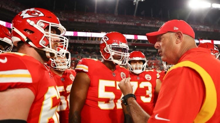 Kansas City Chiefs offensive line coach Andy Heck talks to the team during a game in Tampa.