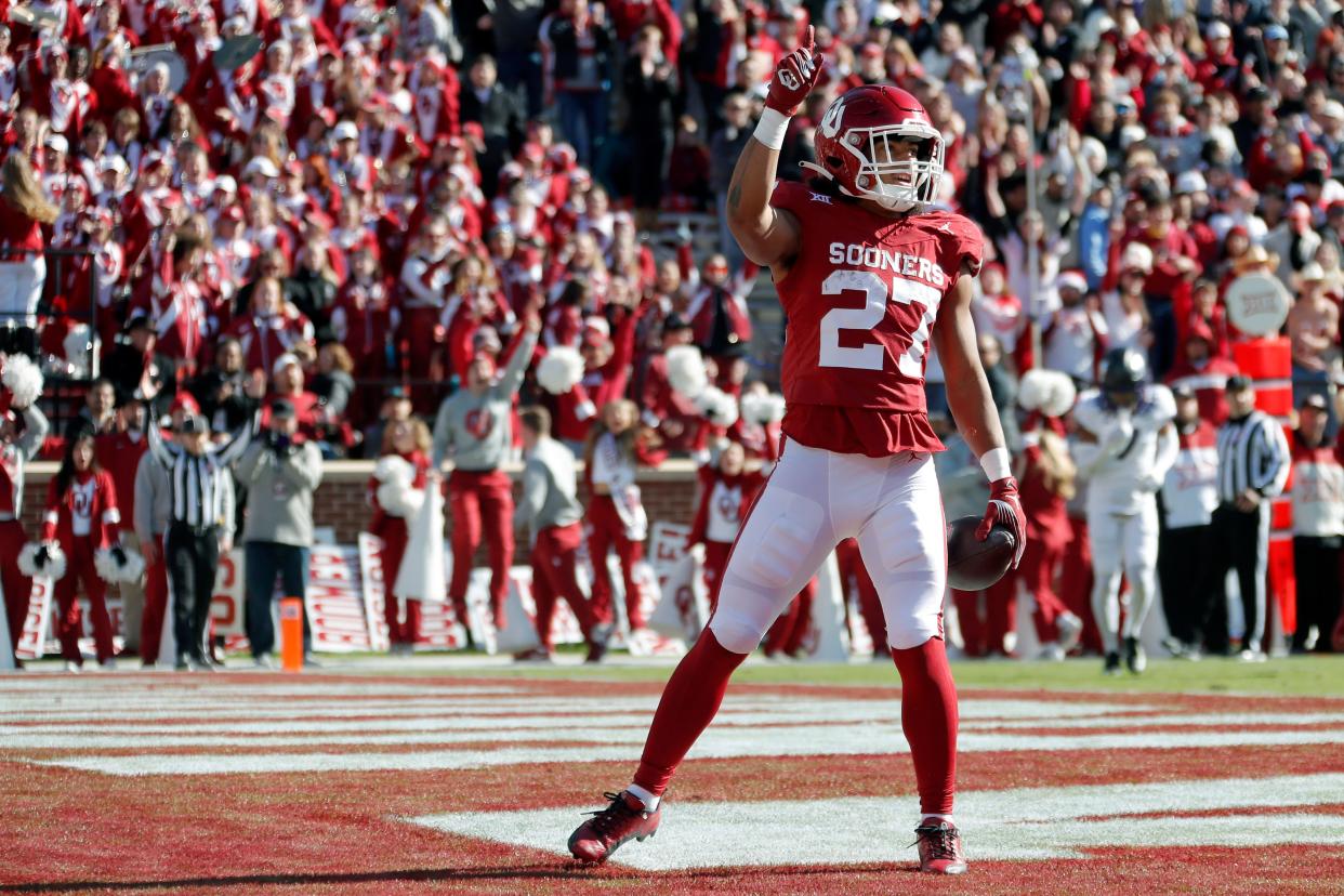 OU running back Gavin Sawchuk (27) celebrates after a touchdown against TCU on Nov. 24, 2023, in Norman.