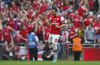 Arsenal's Santi Cazorla celebrates after scoring against Hull City during their FA Cup final soccer match at Wembley Stadium in London, May 17, 2014. REUTERS/Eddie Keogh (BRITAIN - Tags: SPORT SOCCER)