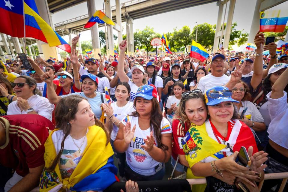 People sing and cheer during a Venezuelan song at a rally at Jose Marti Gym held in support of a fair election on Venezuela’s Election Day on Sunday, July 28, 2024, in Miami.