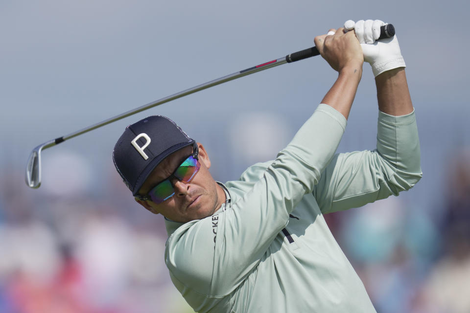 United States' Rickie Fowler plays his tee shot from the 4th on the first day of the British Open Golf Championships at the Royal Liverpool Golf Club in Hoylake, England, Thursday, July 20, 2023. (AP Photo/Kin Cheung)