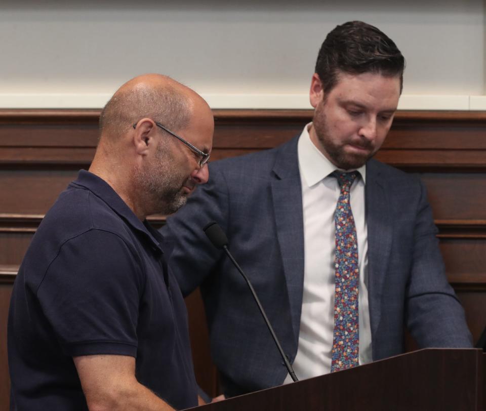 Sydney Powell, father Steve Powell accompanied by the family attorney Jeff Laybourne testifies on behalf of his daughter during a pretrial hearing in Summit County Common Pleas Judge Kelly McLaughlin's court.