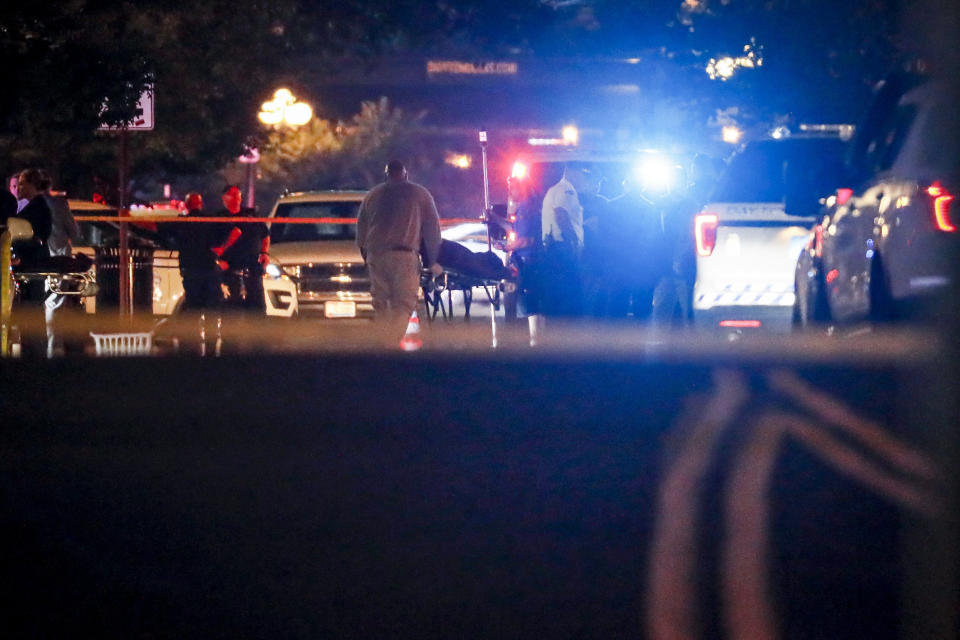 Bodies are removed from the scene of a mass shooting early Sunday in Dayton, Ohio. (Photo: ASSOCIATED PRESS)