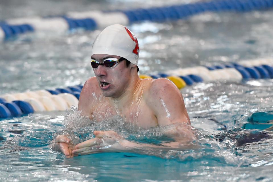 Canandaigua's Jack Chapman swims in a preliminary heat of the 200 yard individual medley during the 2022 NYSPHSAA Boys Swimming & Diving Championships in Ithaca, N.Y., Friday, March 4, 2022.