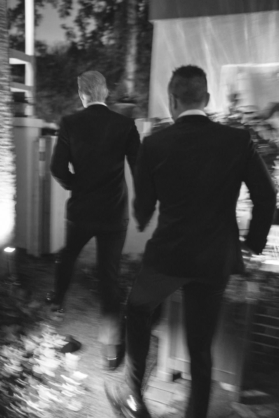 a couple of men walking