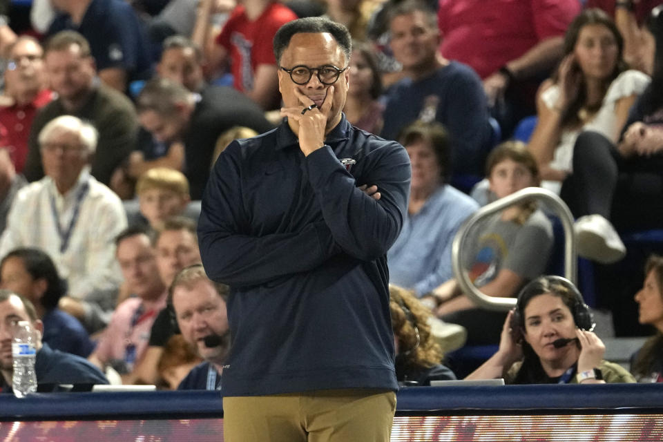 Liberty head coach Ritchie McKay watches during the second half of an NCAA college basketball game against Florida Atlantic, Thursday, Nov. 30, 2023, in Boca Raton, Fla. (AP Photo/Lynne Sladky)