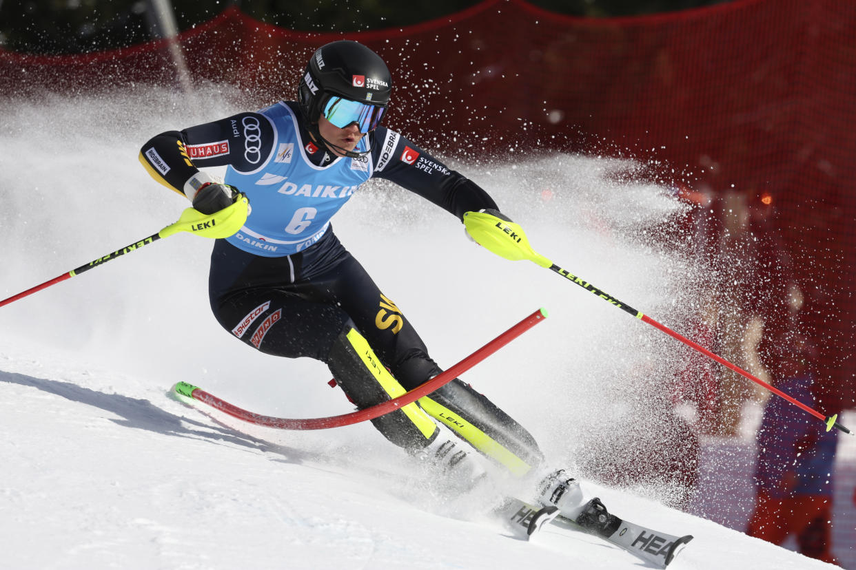 Sweden's Anna Swenn Larsson speeds down the course during an alpine ski, women's World Cup slalom, in Are, Sweden, Saturday, March 11, 2023. (AP Photo/Alessandro Trovati)