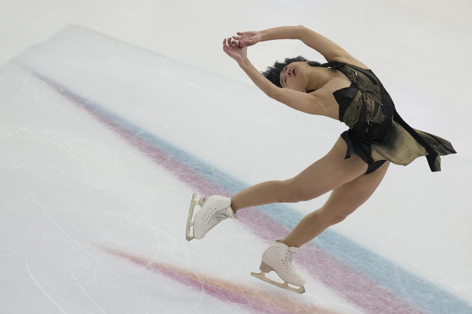 Japan's Kaori Sakamoto competes during the Women's Short Program at the figure skating Grand Prix finals at the Palavela ice arena, in Turin, Italy, Friday, Dec. 9, 2022. (AP Photo/Antonio Calanni)