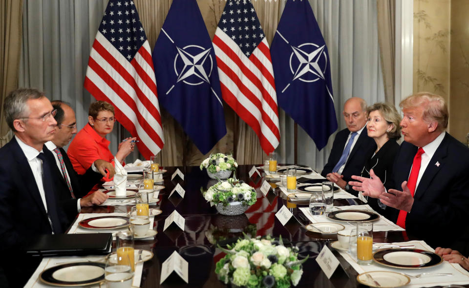 <p>President Trump holds a breakfast meeting with NATO Secretary-General Jens Stoltenberg, left, at the NATO Summit in Brussels on July 11, 2018. (Photo: Kevin Lamarque/Reuters) </p>