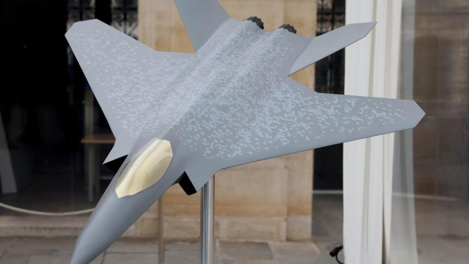 A model of the Future Combat Air System, a European aircraft in development by Dassault Aviation, is on display in the courtyard of the Presidential Elysee Palace in Paris during a Jan. 22, 2023, meeting attended by the French president and German chancellor. (Ludovic Marin/AFP via Getty Images)