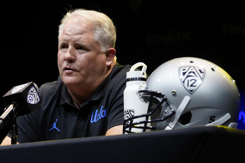 FILE - UCLA coach Chip Kelly speaks during the Pac-12 Conference NCAA college football media day on July 29, 2022, in Los Angeles. Kelly enters his sixth season as the Bruins’ coach after winning eight games a year ago. UCLA and USC are playing their final season in the Pac-12 before leaving for the Big Ten. (AP Photo/Damian Dovarganes, File)