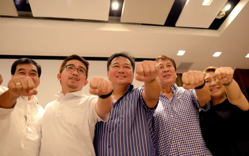 Davao Del Norte Representative Pantaleon Alvarez (C) of the Partido Demokratiko Pilipino-Lakas ng Bayan (PDP-Laban) pose for a picture after officiating an oath taking of Mindanao lawmakers as new members of PDP-LABAN, the political party of Philippines&#39; president-elect Rodrigo Duterte, at a hotel in Manila on May 24, 2016. Business titans, turncoat politicians, celebrities and rebel leaders are descending on the long-neglected far southern Philippines, hoping to gain favour with the nation&#39;s shock new powerbroker. The remote and dusty city of Davao has suddenly become the country&#39;s new seat of power after hometown hero Rodrigo Duterte won last week&#39;s presidential election in a landslide. / AFP / NOEL CELIS (Photo credit should read NOEL CELIS/AFP via Getty Images)