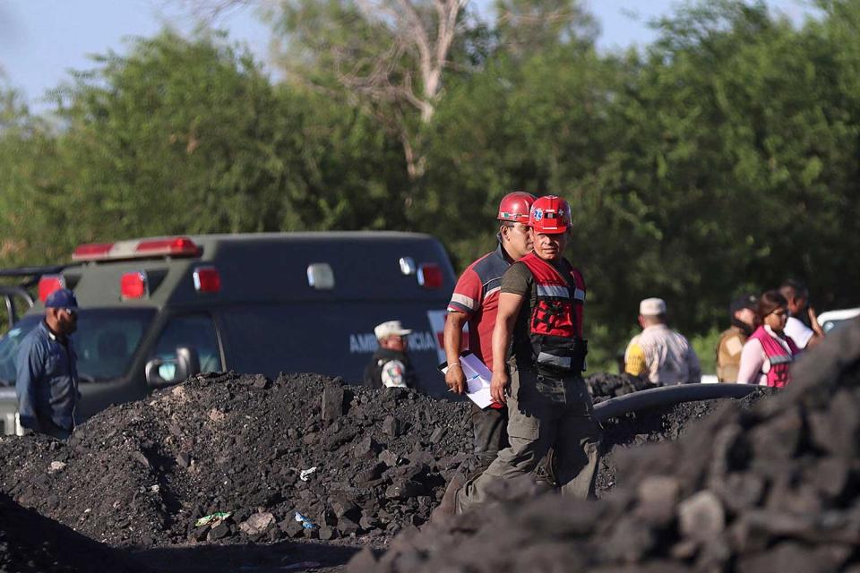 Rescue personnel work in the area of an accident at a coal mine, following a collapse which left -up to now- nine miners trapped, in the Agujita area, Sabinas municipality, Coahuila state, Mexico, on August 3, 2022.