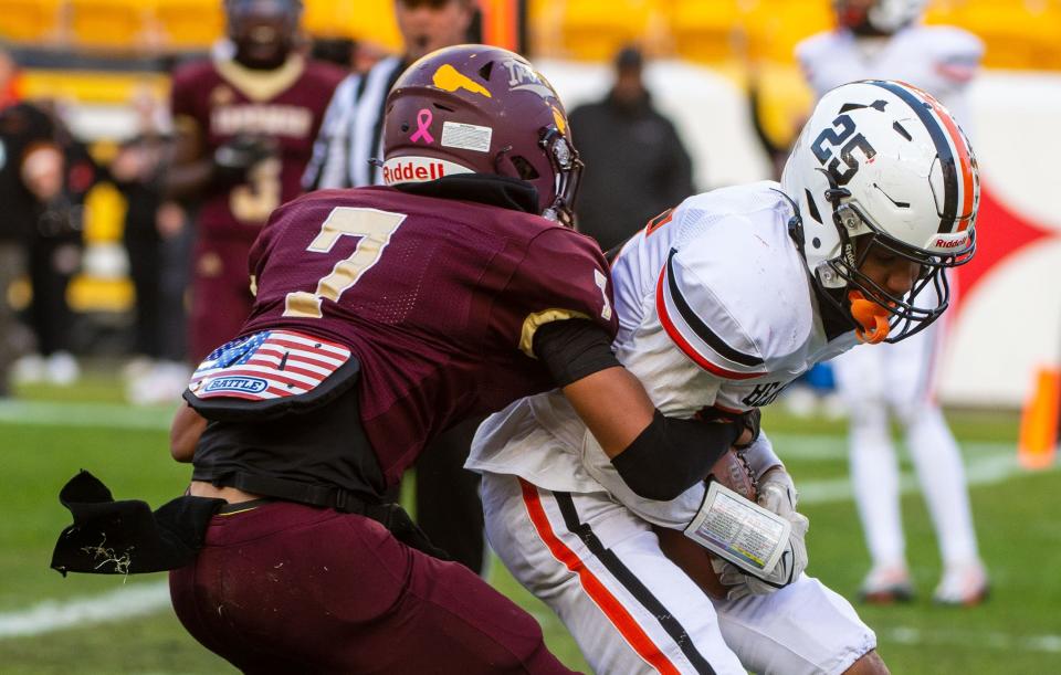 Beaver Falls' Da'Sean Anderson scores a two-point conversion against Steel Valley's Cruce Brookins  in the WPIAL Class 2A Championship Friday at Acrisure Stadium. [Lucy Schaly/For BCT]