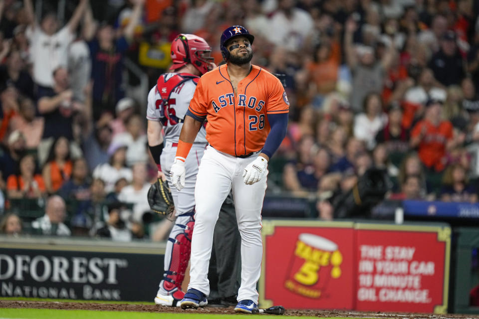 Houston Astros' Jon Singleton watches his three-run home run against the Los Angeles Angels during the second inning of a baseball game Friday, Aug. 11, 2023, in Houston. (AP Photo/Eric Christian Smith)