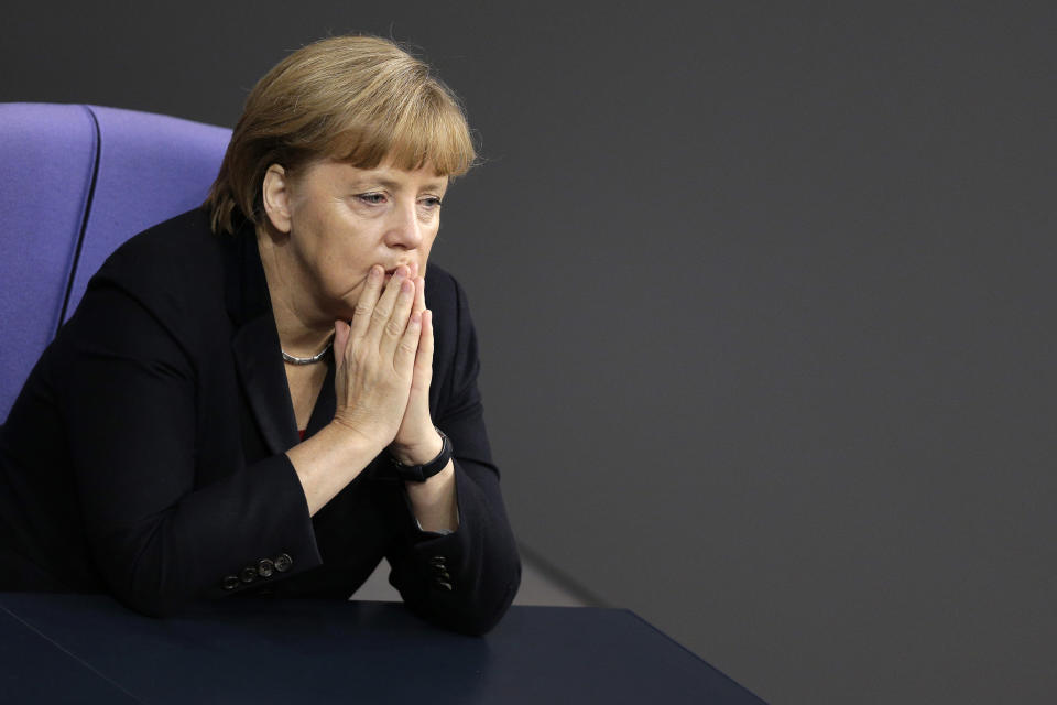 German Chancellor Angela Merkel attends a meeting of the German federal parliament, Bundestag, in Berlin, Germany, Thursday, Nov. 29, 2012. (AP Photo/Michael Sohn)
