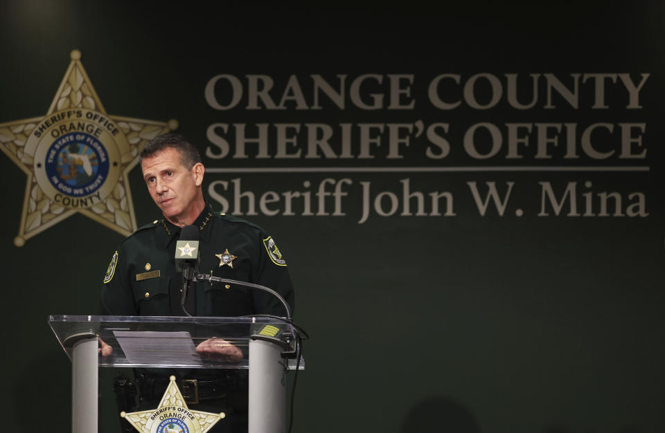 Orange County Sheriff John Mina addresses the media during a press conference about multiple shootings, Wednesday, Feb. 22, 2023, in Orlando, Fla. A central Florida television journalist and a little girl were fatally shot Wednesday afternoon near the scene of a fatal shooting from earlier in the day, authorities said. Mina said that they’ve detained Keith Melvin Moses, 19, who they believe is responsible for both shootings in the Orlando-area neighborhood. (Ricardo Ramirez Buxeda/Orlando Sentinel via AP)