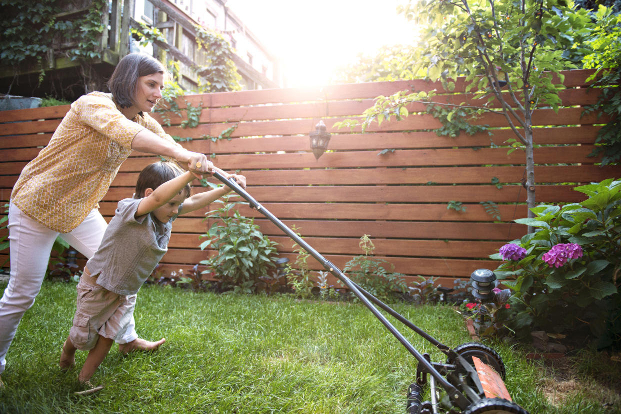 Scooch over helicopter parents, lawnmower mums and dads are the new pushy parents [Photo: Getty]